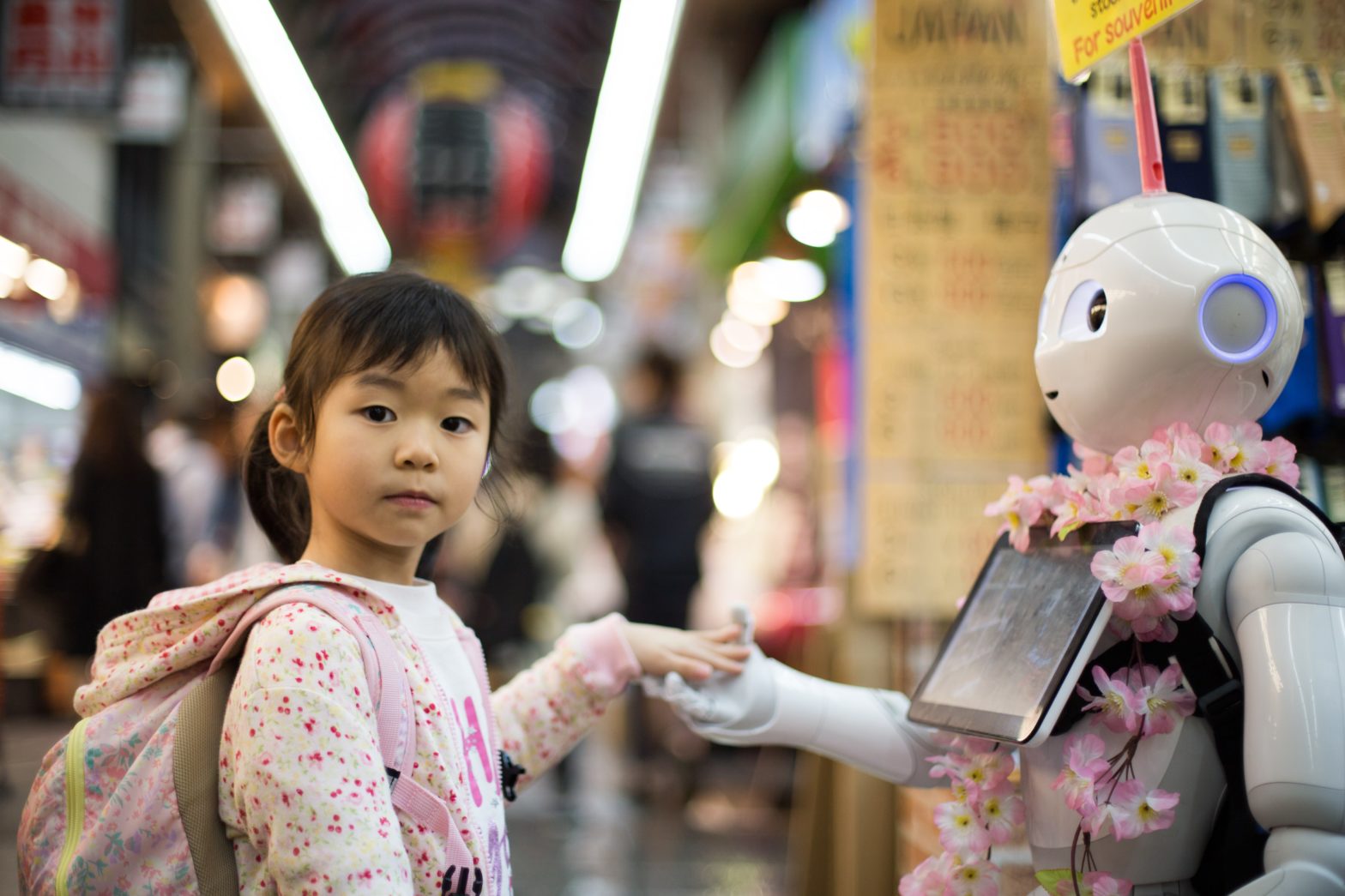 Girl and Pepper Robot